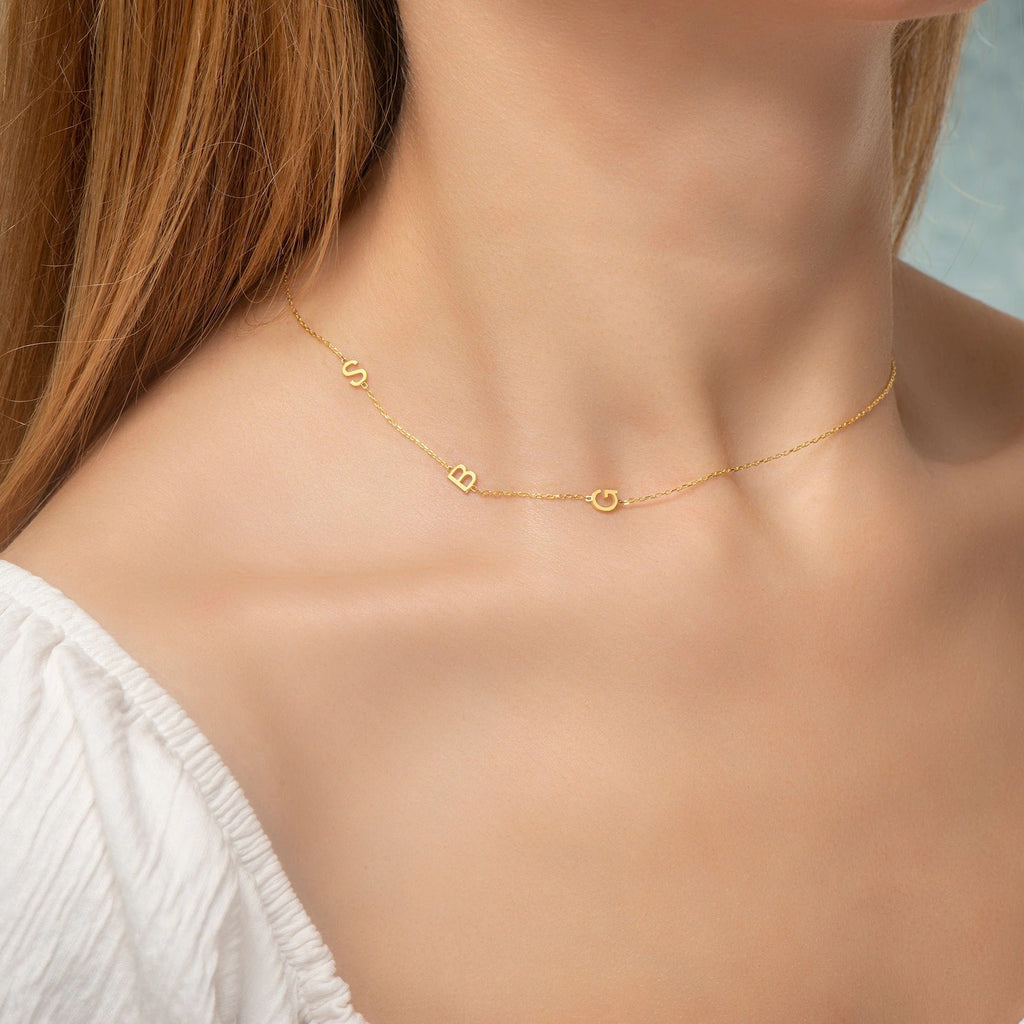 Solid gold sideways mini key necklace with personalized initial in 10K, 14K  or 18K gold.