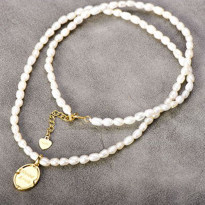 Solid 14K Gold Pearl Lucky Necklace